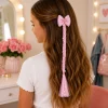 Haarextension met strikje en parels roze